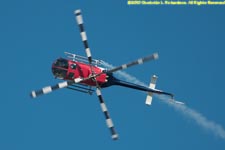 Red Bull helicopter flying inverted