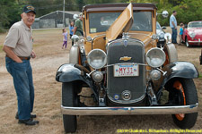 antique car and owner