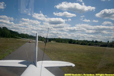 preparing to take off with a glider on tow